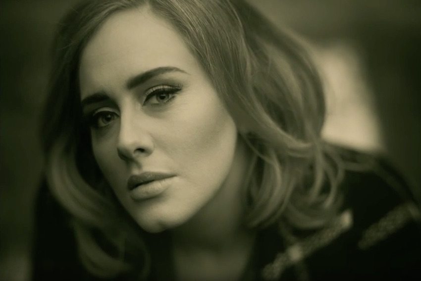 Adele leads charts with contemplative, somber single