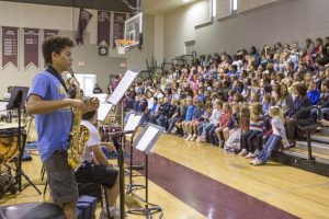 Elementary choir prepares for their performance in Santa Cruz, May 7.