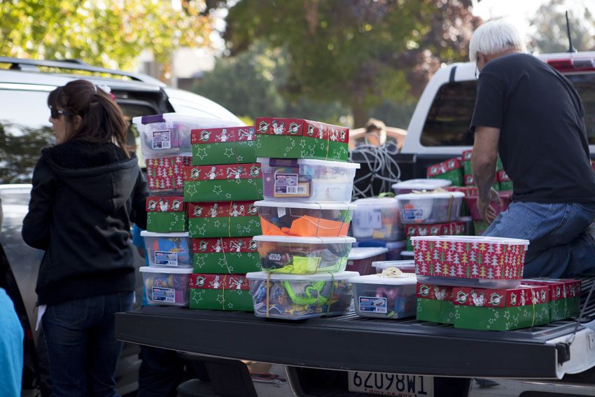 Last year's drive met a 300-box goal. ASB President Roman Endicott donates 400 boxes this year.