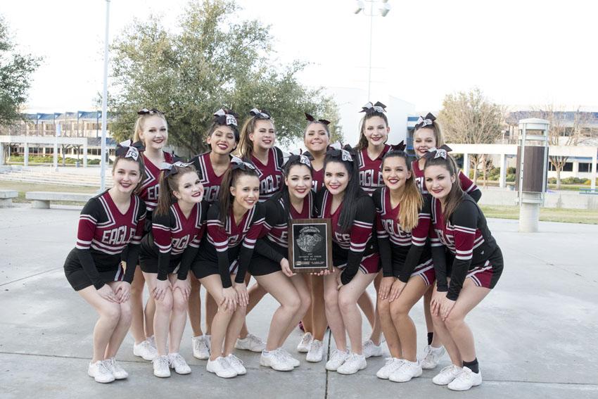 The varsity team with their award from the CIF cheer competition in Fresno.