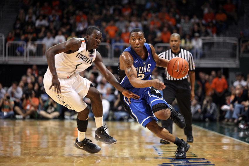 FEB. 13, 2011-Coral Gables, Florida, U.S - Duke Blue Devils guard  Nolan Smith (2) drive past Miami Hurricanes guard Durand Scott (1) during  the game between Miami and Duke at Bank United Center in Coral Gables, Florida.The Duke Blue Devils defeated the Miami Hurricanes 81-71