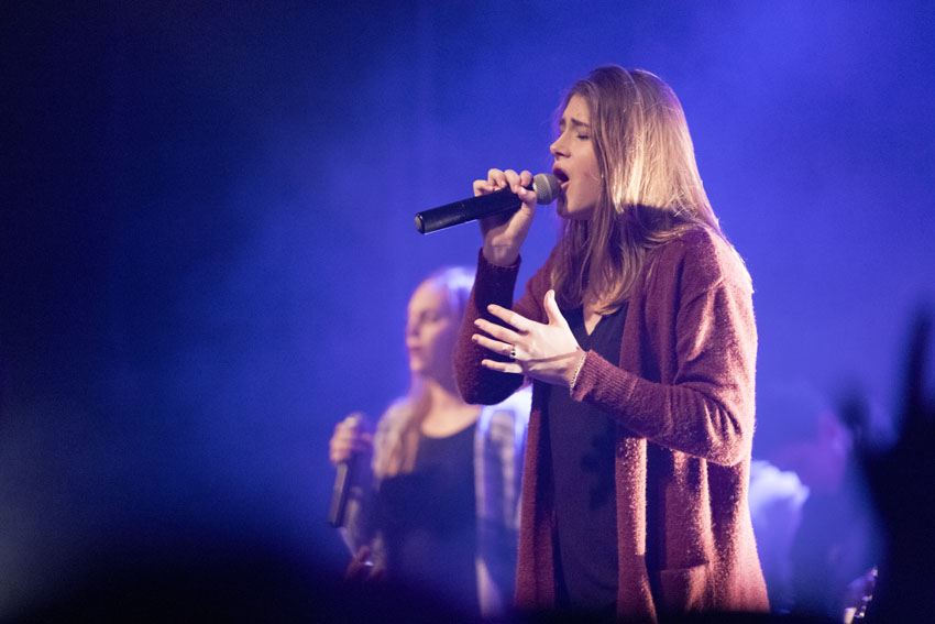 Macie Thompson, '19, leads worship for FCS