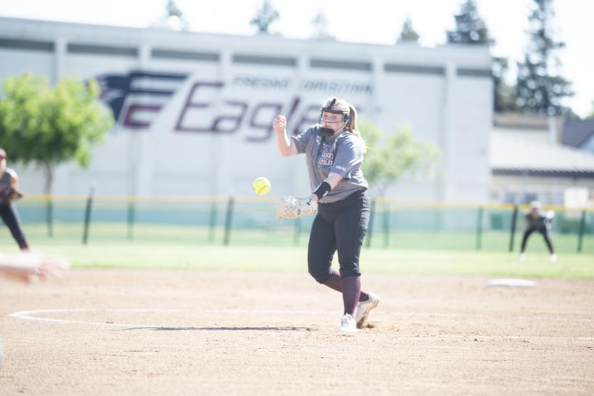 As+the+pitcher+winds+up+to+throw+a+strike%2C+the+batters+hands+grasp+the+bat+tighter+as+they+prepare+to+hit+ball+and+advance+to+the+bases.%C2%A0+Moving+from+the+West+Sequoia+League+into+the+East+Sierra+League%2C+the+softball+team+competes+for+the+Valley+Champions+title.