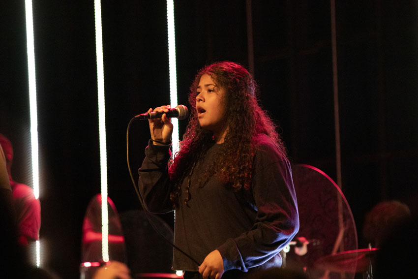 Aimee Castañeda displays passion through singing, performing