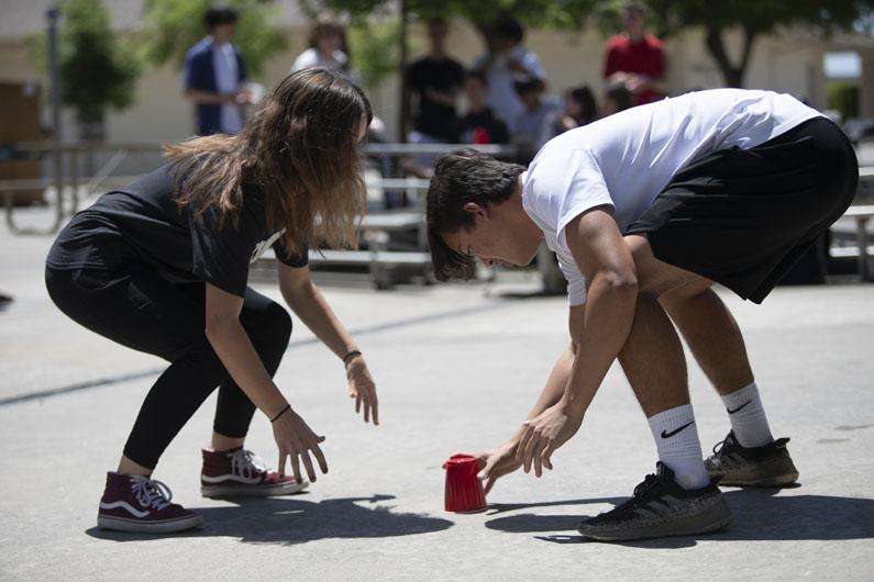 Students Aubrey Graham, 23, and Mateo Pascual, 23 go head to head in the Cinco De Mayo lunch activity.
