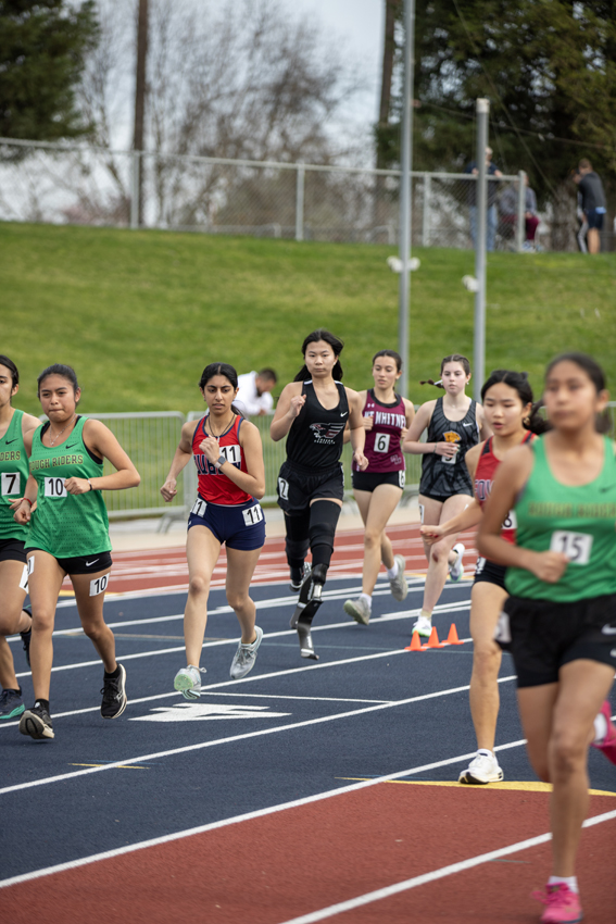 Baylay Wong, 26, merges into the first lane at the 200 mark of the 800 meters, Feb 23.