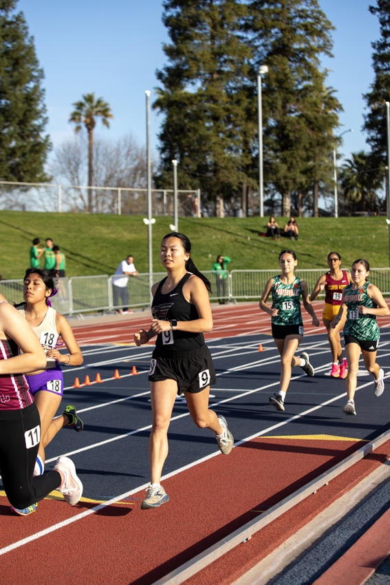 Laina Penland, 25, speeds up for her last lap around the track for the 800 meters, Feb 23.