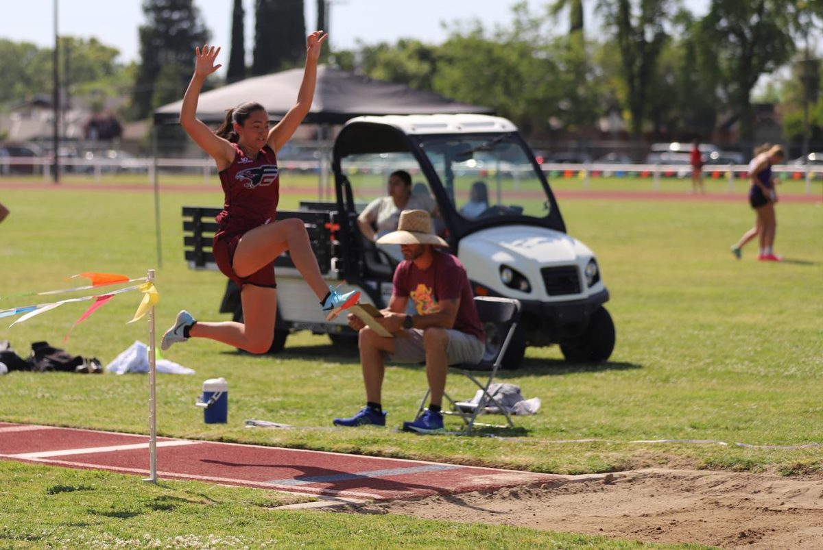 Meilani+Gilmore-Young%2C+24%2C+serving+as+team+captain%2C+competes+in+long+jump.+This+is+one+of+the+four+jumping+events+in+Track+and+Field.+
