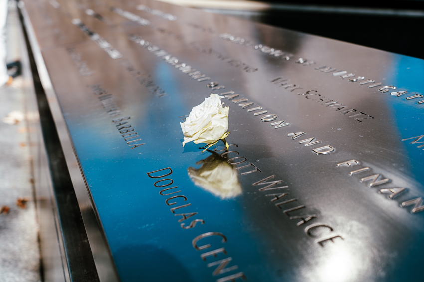 To remember each life lost during the terrorist attacks in New York, white roses are placed at each name on their birthday.
