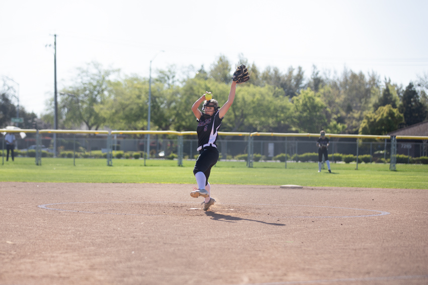 Freshman, Madison Bishel, pitches the ball, Mar. 19. 
