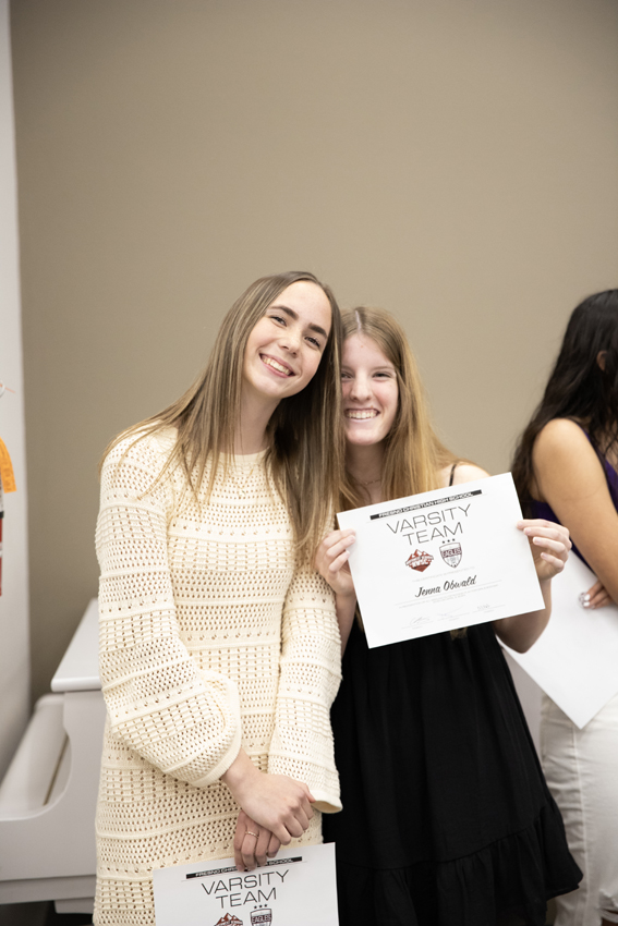 Seniors, Grace LaCroix and Jenna Obwald pose for a picture with their awards, April. 2. 