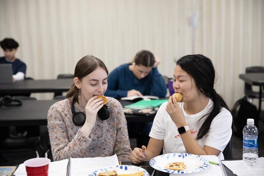 Spanish students enjoy cookies from one of the food trucks, Jan. 31. 