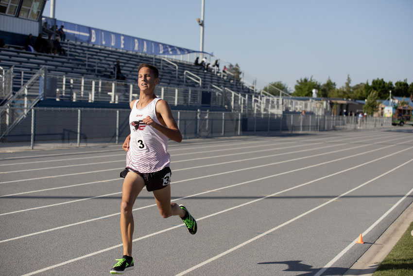 Freshman Blake Bay runs the 3200M at Caurthers High School.