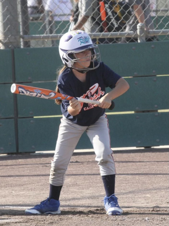 Young Rachel Martin bats for her team.