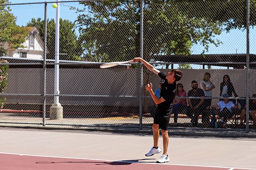 Jacob Pimentele, 25, serves the ball at valley championships.