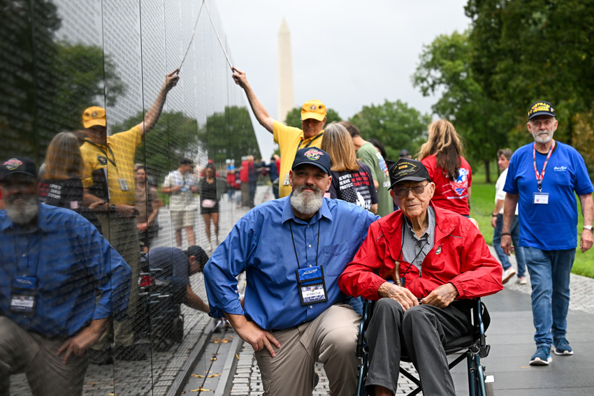 Guardian Kristopher Head and Veteran George Clausen at the Vietnam Wall. 