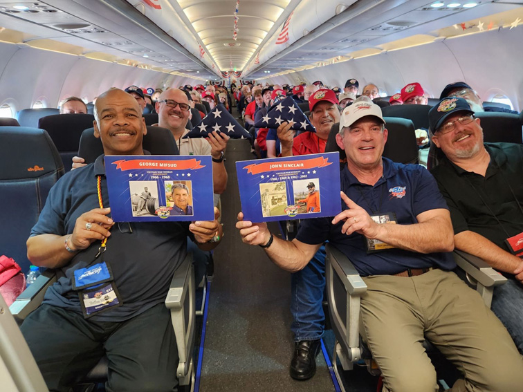 On board with the CV Honor Flight Team and the Flags of our Heroes veterans that passed away before their flight.  