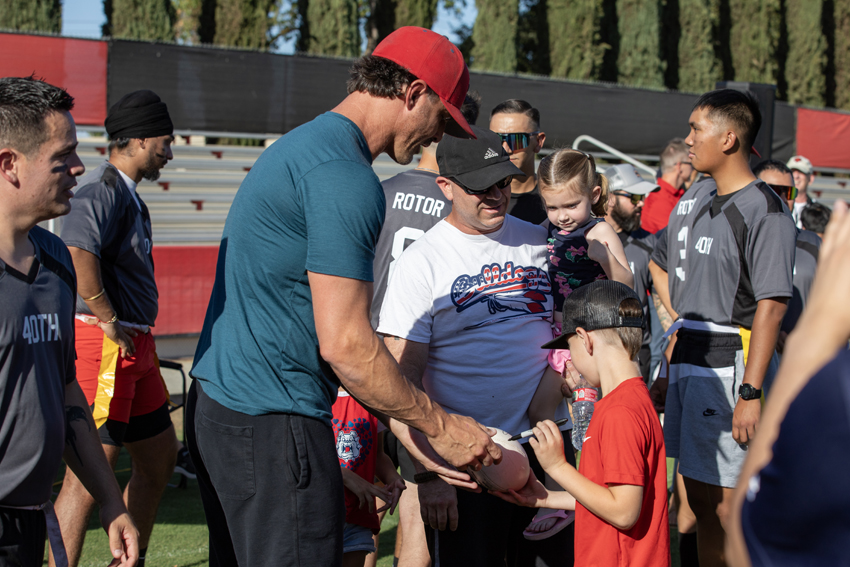 Former NFL QB David Carr signing little boys football, Sept. 14.