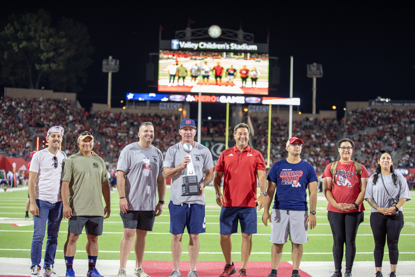 40th Combat Aviation players honored at FSU's Heroes Night, alongside retired Colonel Shiloh Briggs and Veteran Sponsor Ed Dunkel, Sept. 14.