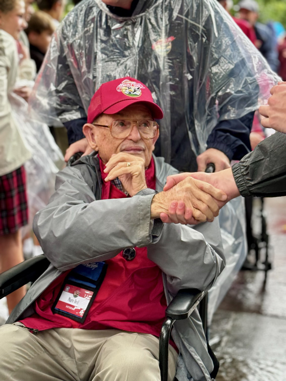 Marv Beil greeted by school children and bystanders at Arlington National Cemetery, Sept. 18.