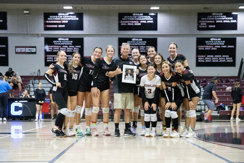 Coach Steve Guglielmana was honored with a signed picture from the 2024 FC girl's varsity volleyball team. 