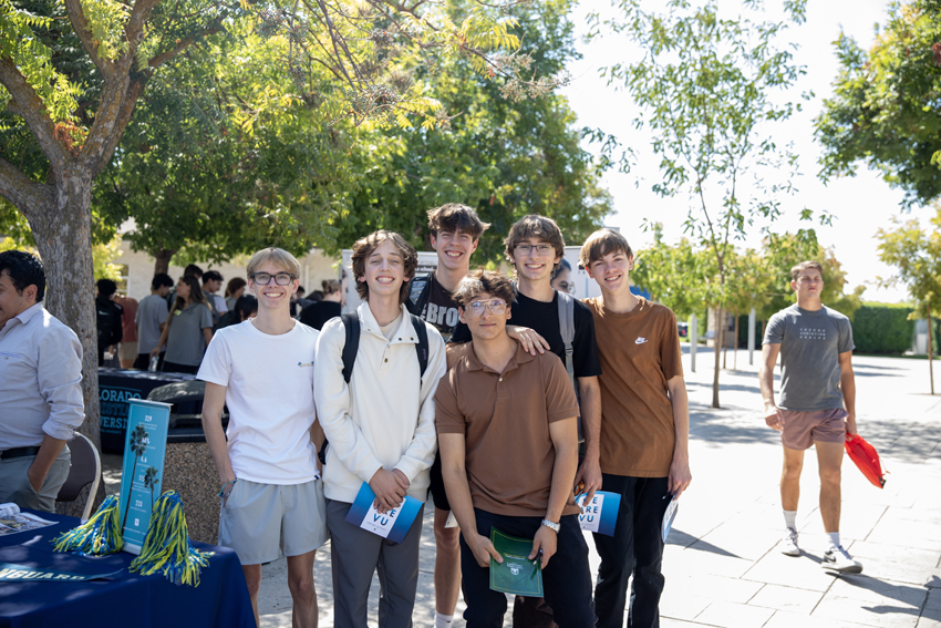 Students go to the college fair on campus at lunch, Oct. 1.