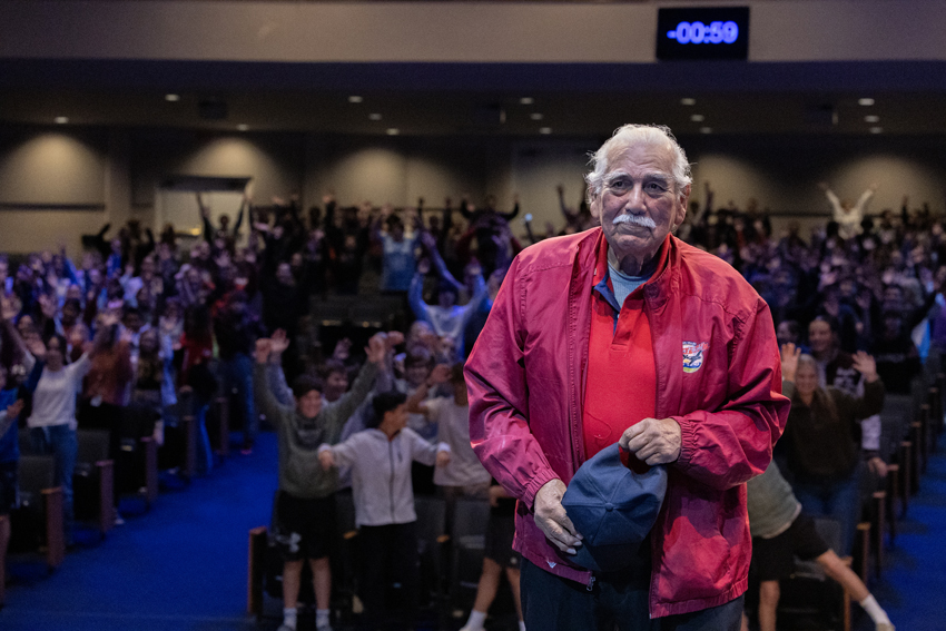 Korean War veteran and prisoner of war, Sam Banuelos, is interviewed by local radio host Paul Loeffler during Fresno Christian's annual Veteran's Day chapel, Nov. 7.