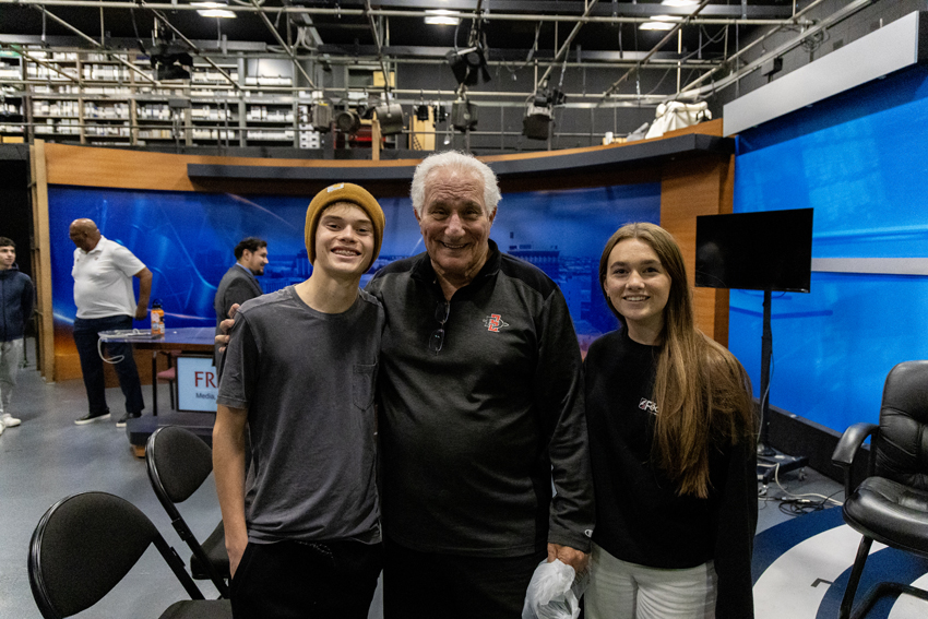 Ted Leitner, legendary sports play by play announcer, meets with sophmores  Brody Elrod and Selah Neal. 