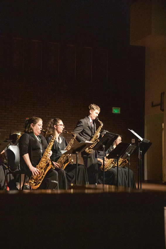 Saxophones players show off their hard work for the audience. 