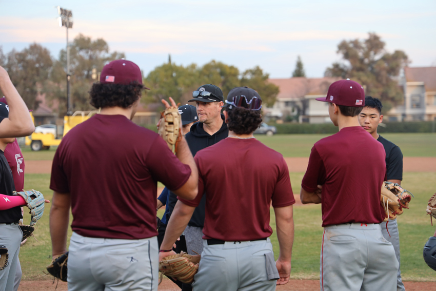 Head Coach Aaron Penberthy huddled up with his team as they prep for the coming season. 