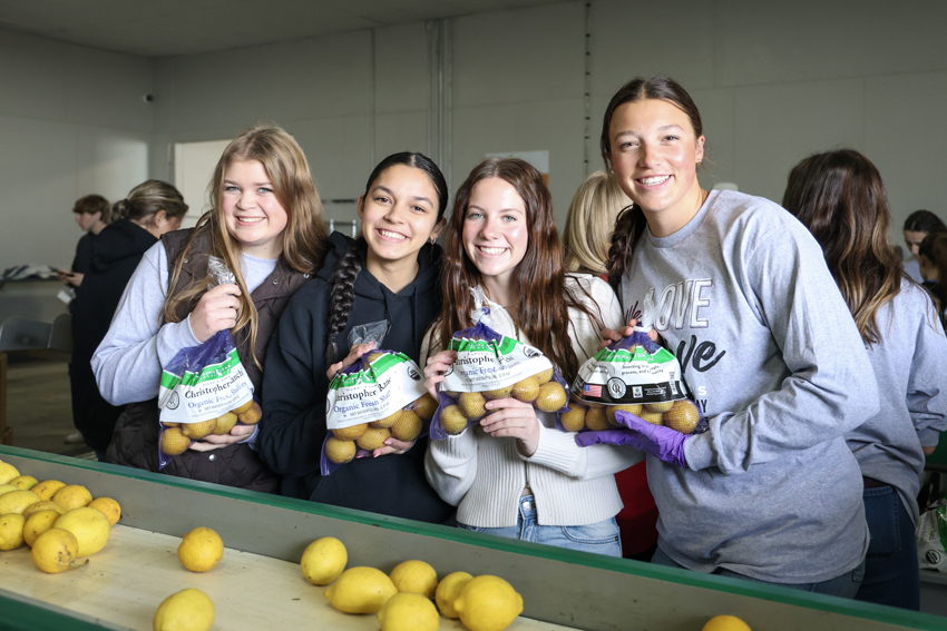 Students serve at the Central California Food Bank, Feb. 14.