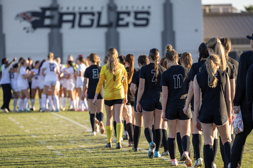 FC Girls Soccer lines up to congratulate Sacred Heart Prep on their State Championship win.