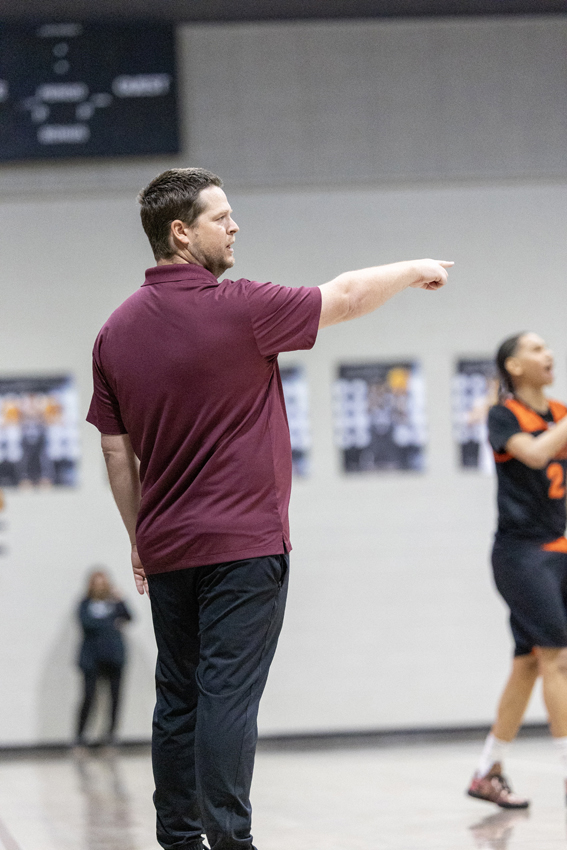 Jon Penberthy directs his team on the court in Round III of State Playoffs.
