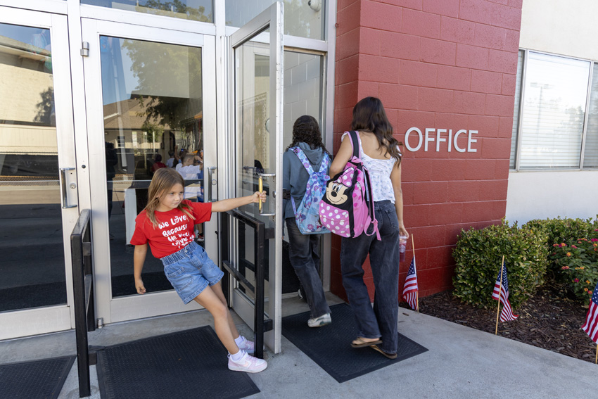 High school students heading into building five for their classes.