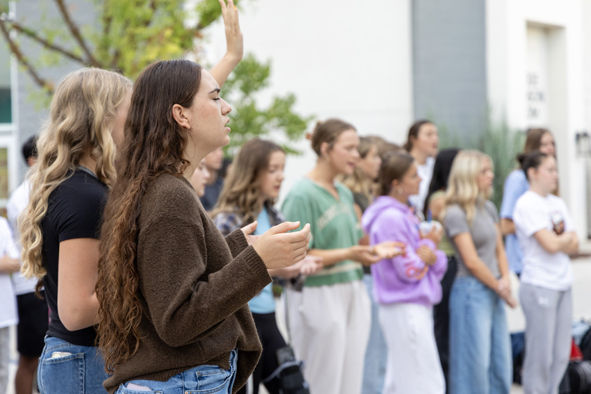 Mya Mericle, '28, worships at the 24th year of See You at the Pole. 