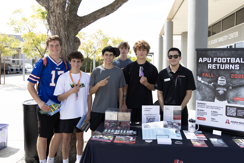 Fresno Christian Seniors pose with Azusa Pacific University representative.
