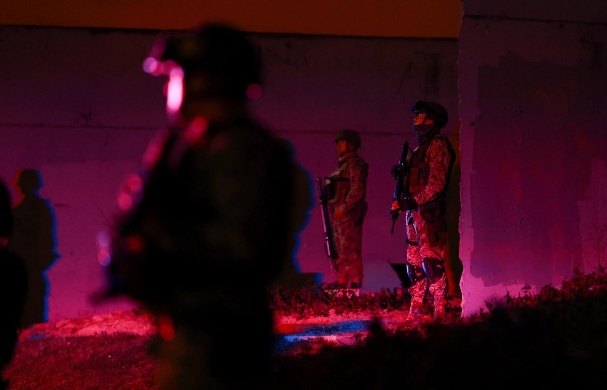 Members of the Mexican army stand guard at a roundabout on a main avenue, following a military operation in which Mexican officials said cartel boss Nemesio Oseguera, "El Mencho," was killed in Jalisco state, in Guadalajara, Mexico, February 23, 2026. REUTERS/Jose Luis Gonzalez
