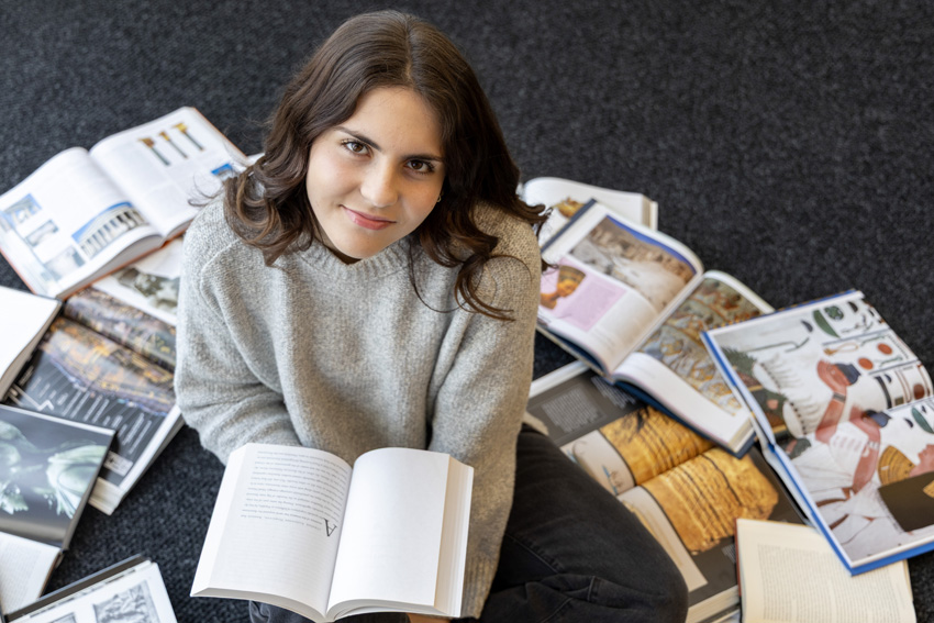 Feldkamp loves spending time reading her vast collection of history books. She particularly enjoys Ancient Greek history, specifically mythology and architecture. 