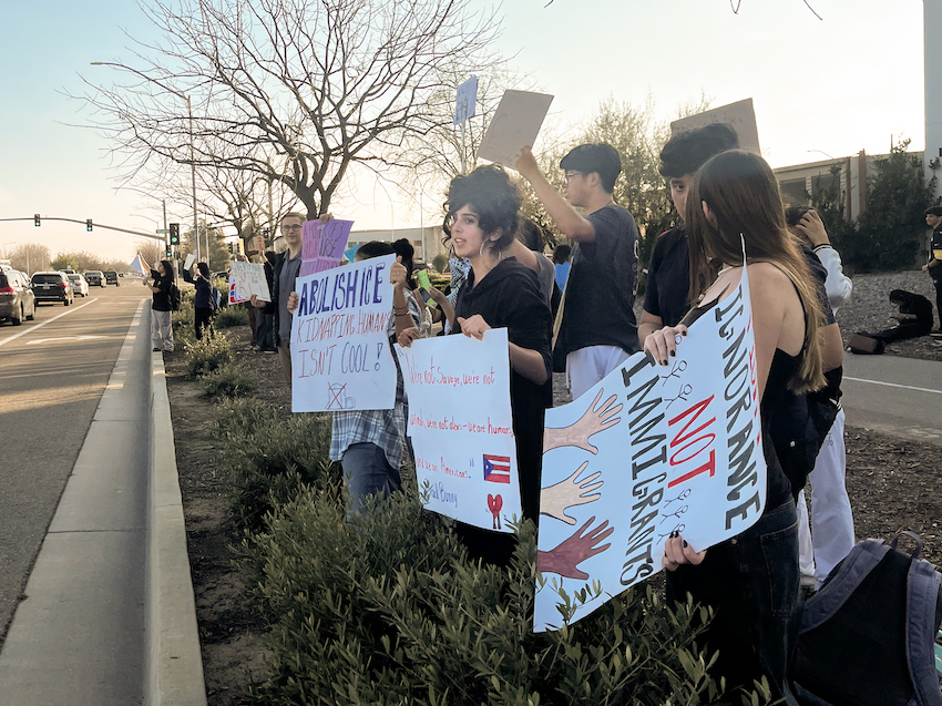 Clovis students line the street in protest of I.C.E.'s presence in cities, Feb. 6. 