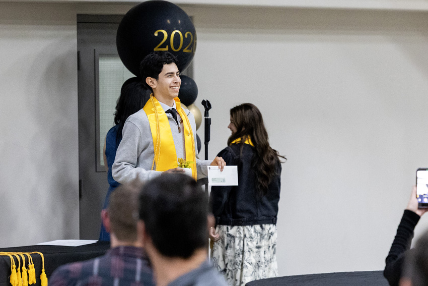 Senior Christian Martinez receives the student nominated CSF Scholarship.